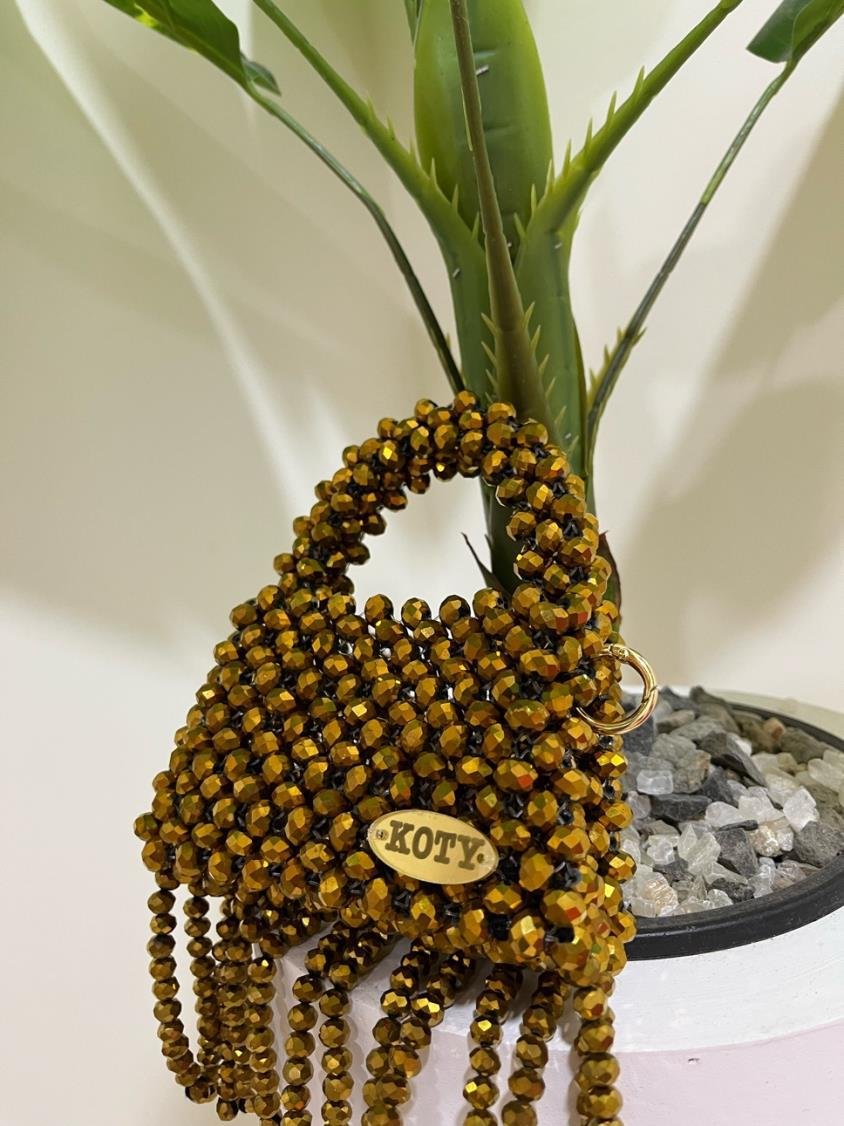 img32 golden bag - الصورة 1